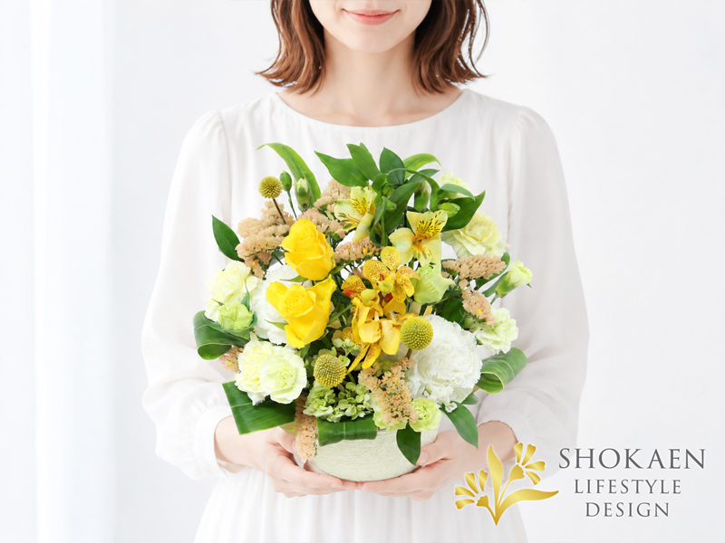 ペット お供え花 全国発送・正花園の黄と白を基調とした温かみある供花バスケットアレンジメント「陽和」